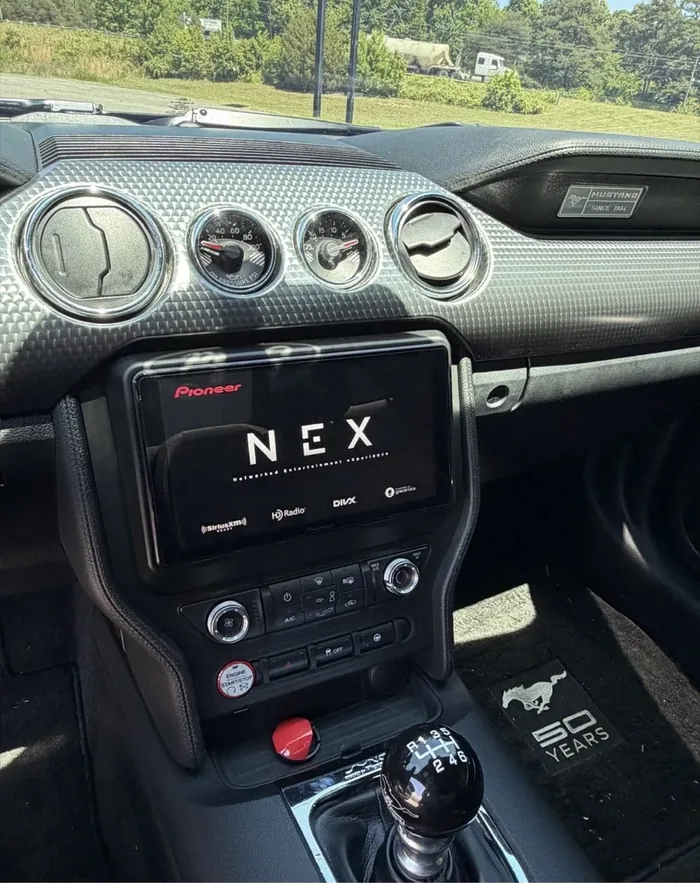Pioneer NEX touchscreen head unit installed in a Ford Mustang dash
